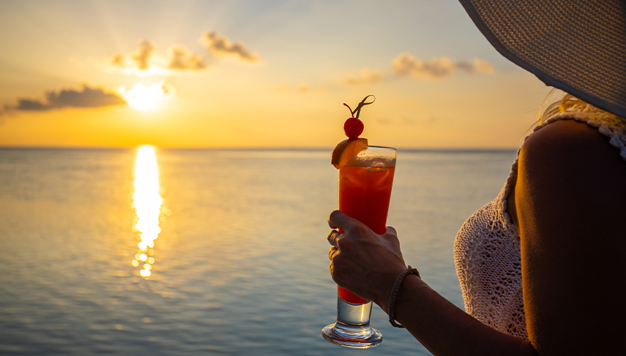 Sunset with a cocktail